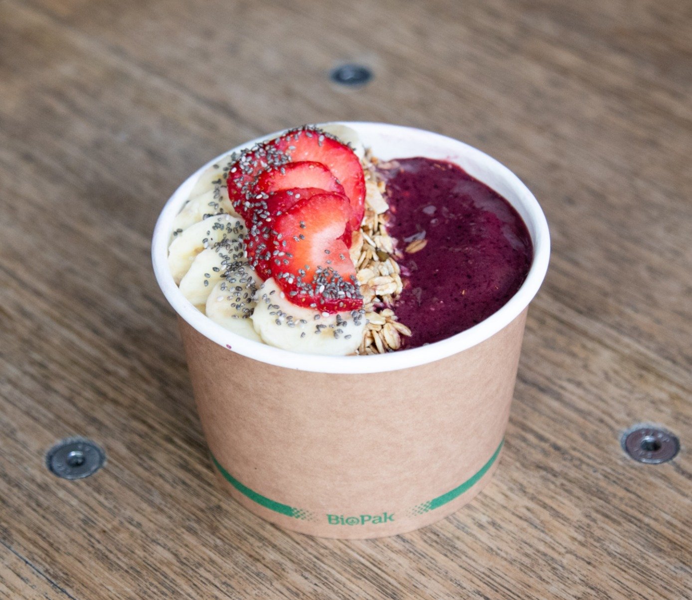 our bowls are blended fresh frozen fruit and topped with fresh fruit and super food goodies